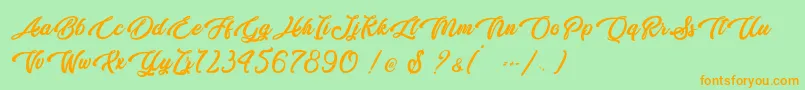 Butterfly Kiss   Personal Use Font – Orange Fonts on Green Background