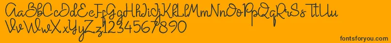 Butterland-Schriftart – Schwarze Schriften auf orangefarbenem Hintergrund