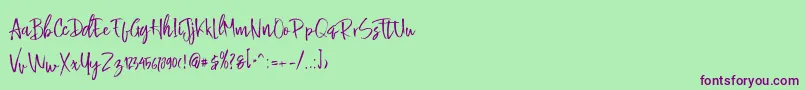 Czcionka Buttle – fioletowe czcionki na zielonym tle