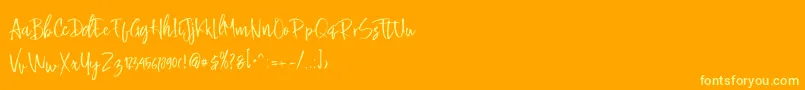Buttle-Schriftart – Gelbe Schriften auf orangefarbenem Hintergrund