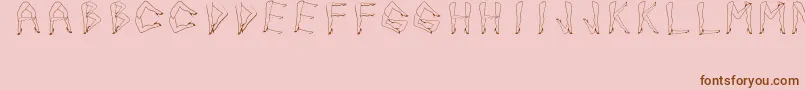 JuanjoSHotLegs-Schriftart – Braune Schriften auf rosa Hintergrund