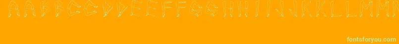 Fonte JuanjoSHotLegs – fontes verdes em um fundo laranja
