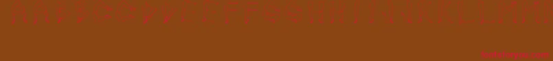 JuanjoSHotLegs Font – Red Fonts on Brown Background