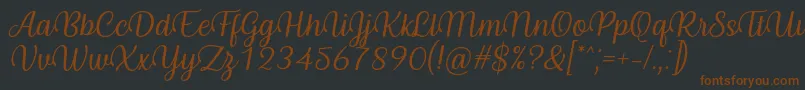 Шрифт Byby Font Italic – коричневые шрифты на чёрном фоне