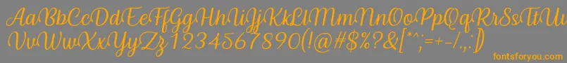 Byby Font Italic-fontti – oranssit fontit harmaalla taustalla
