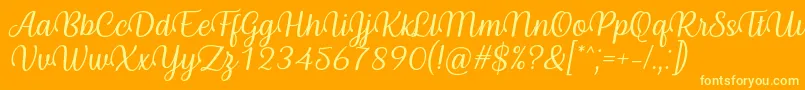 Byby Font Italic-Schriftart – Gelbe Schriften auf orangefarbenem Hintergrund