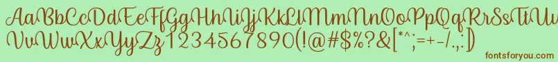 フォントByby Font Regular – 緑の背景に茶色のフォント