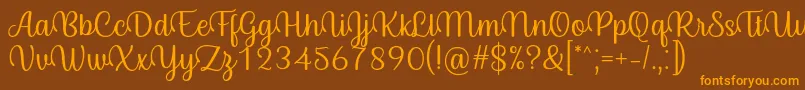 Byby Font Regular-Schriftart – Orangefarbene Schriften auf braunem Hintergrund