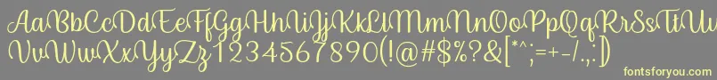 フォントByby Font Regular – 黄色のフォント、灰色の背景