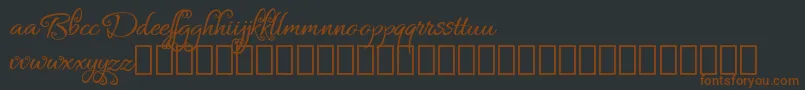 Czcionka Bykars Demo – brązowe czcionki na czarnym tle