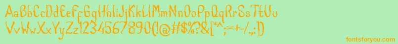 フォントCaboge Font by 7NTypes – オレンジの文字が緑の背景にあります。