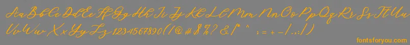 Cadosa Script-Schriftart – Orangefarbene Schriften auf grauem Hintergrund