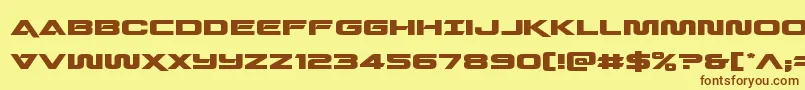 フォントQuarkstormexpand – 茶色の文字が黄色の背景にあります。