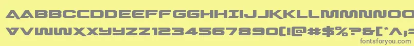 フォントQuarkstormexpand – 黄色の背景に灰色の文字