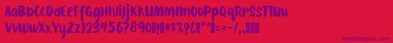 Шрифт CAIBOJOGRegular – фиолетовые шрифты на красном фоне