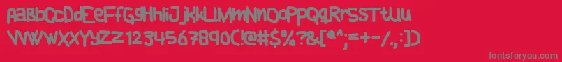 フォントCAKE    – 赤い背景に灰色の文字