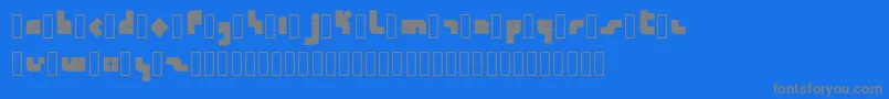 Calendra Regular-fontti – harmaat kirjasimet sinisellä taustalla