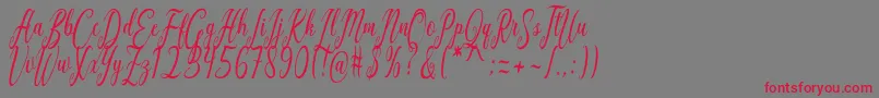 フォントCalifornia Script – 赤い文字の灰色の背景