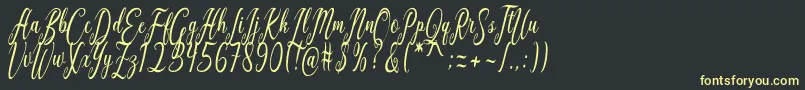 Lisätietoja California Script-fontista California Script-fontti – keltaiset fontit mustalla taustalla