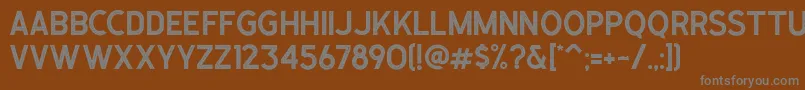 Police Caligor Sans Stamp – polices grises sur fond brun