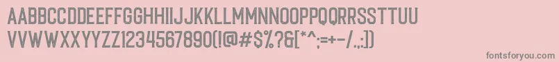 Caligor Stamp-Schriftart – Graue Schriften auf rosa Hintergrund