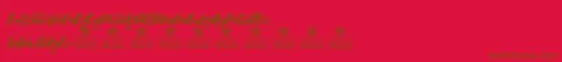 Czcionka Calligraphy Personal Use – brązowe czcionki na czerwonym tle