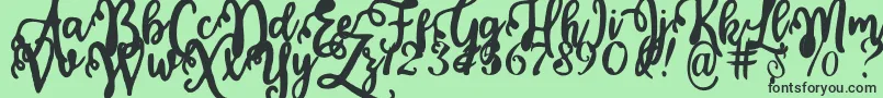 Fonte Calligraphy Stye – fontes pretas em um fundo verde