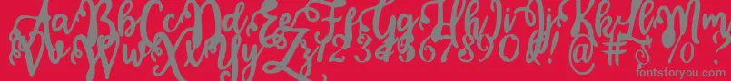 fuente Calligraphy Stye – Fuentes Grises Sobre Fondo Rojo