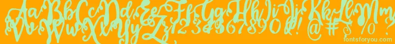 Calligraphy Stye Font – Green Fonts on Orange Background