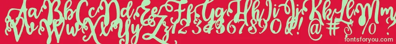 Calligraphy Stye Font – Green Fonts on Red Background
