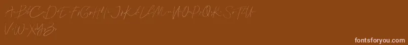 Callous demo-Schriftart – Rosa Schriften auf braunem Hintergrund