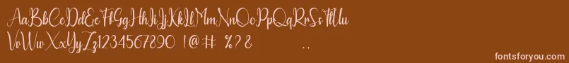 Calyana Personal Use Only-Schriftart – Rosa Schriften auf braunem Hintergrund