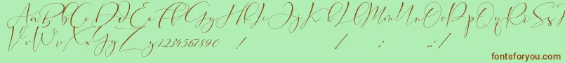 Cameliya Stark-Schriftart – Braune Schriften auf grünem Hintergrund