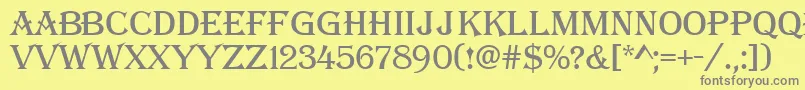 AAlgerius-fontti – harmaat kirjasimet keltaisella taustalla