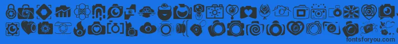 CAMERA   FOTOGRAAMI-Schriftart – Schwarze Schriften auf blauem Hintergrund