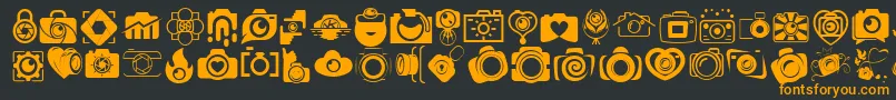 CAMERA   FOTOGRAAMI-Schriftart – Orangefarbene Schriften auf schwarzem Hintergrund