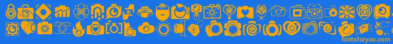 フォントCAMERA   FOTOGRAAMI – オレンジ色の文字が青い背景にあります。