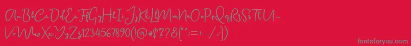 Canadia DF-fontti – harmaat kirjasimet punaisella taustalla