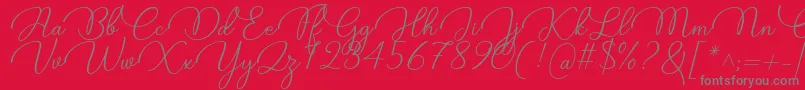 Saiba mais sobre a fonte Candire Font by 7NTypes Fonte Candire Font by 7NTypes – fontes cinzas em um fundo vermelho