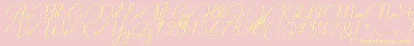 Candire Font by 7NTypes Font – Yellow Fonts on Pink Background