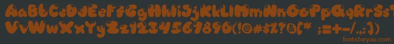 Candyshop Font – Brown Fonts on Black Background