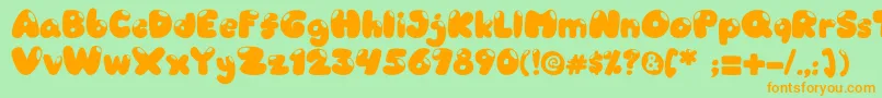Candyshop-Schriftart – Orangefarbene Schriften auf grünem Hintergrund