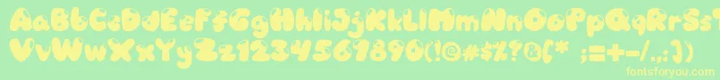 Candyshop Font – Yellow Fonts on Green Background