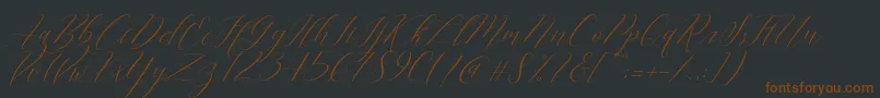 Czcionka Cantona Slant – brązowe czcionki na czarnym tle