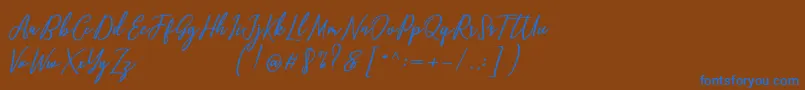 Capital Script Font – Blue Fonts on Brown Background