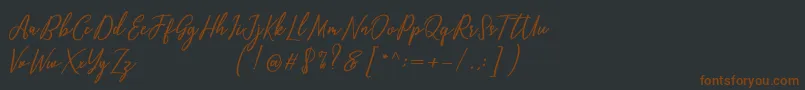 Capital Script-fontti – ruskeat fontit mustalla taustalla