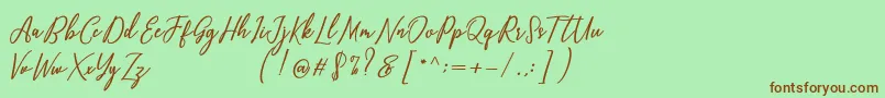 Capital Script Font – Brown Fonts on Green Background