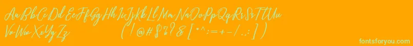 フォントCapital Script – オレンジの背景に緑のフォント