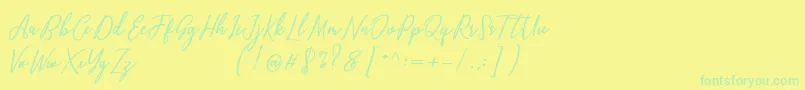 Capital Script Font – Green Fonts on Yellow Background