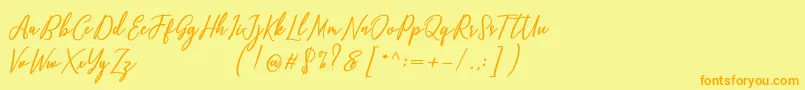 fuente Capital Script – Fuentes Naranjas Sobre Fondo Amarillo